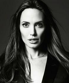 安吉丽娜照片,光影中的魅力女神  第3张